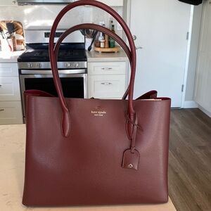 Kate Spade Large Tote - Cherrywood refined grain leather. Interior zip pocket.